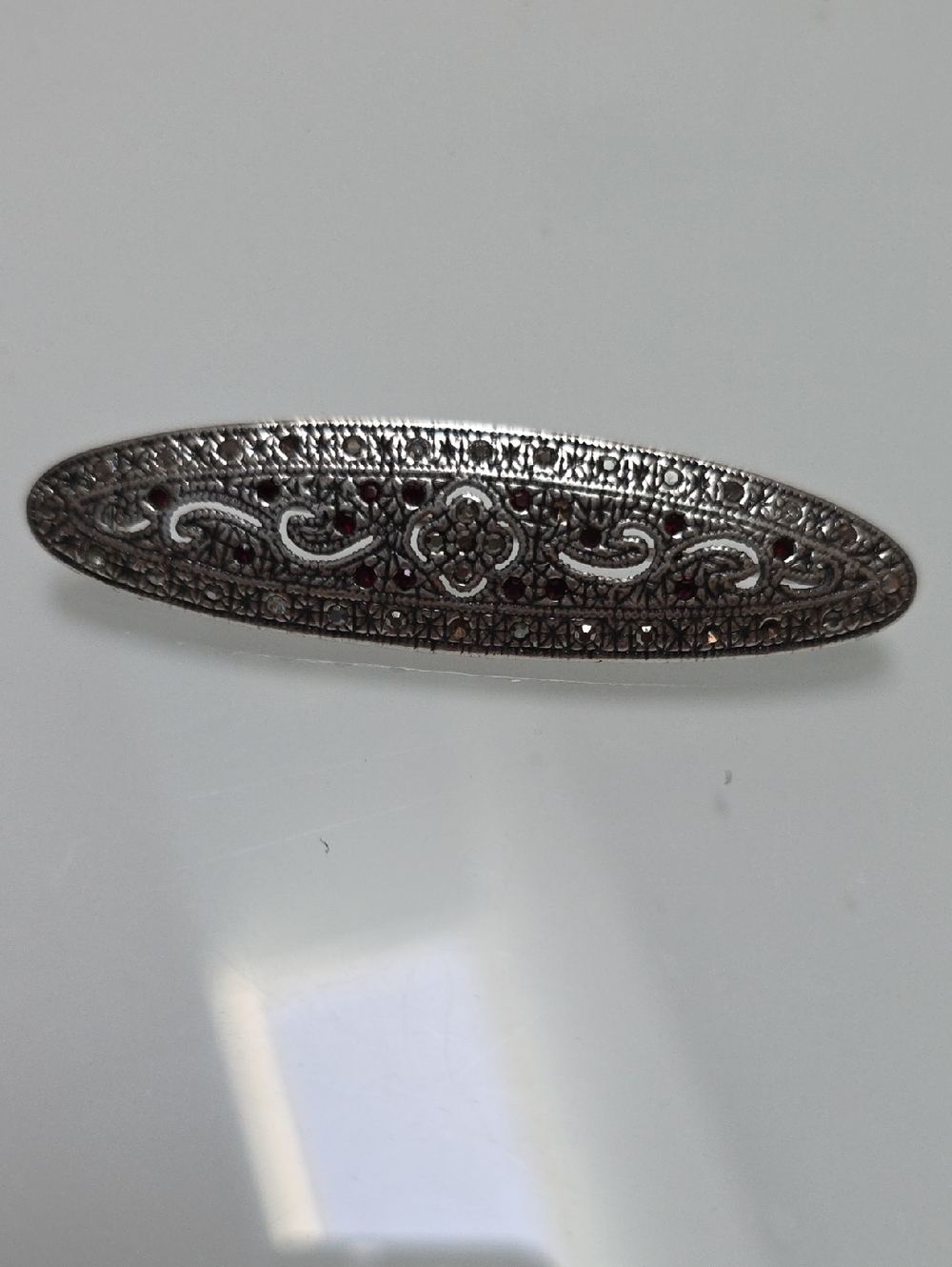 Napier Silver-Tone Marcasite Oval Bar Brooch with Red Accents
